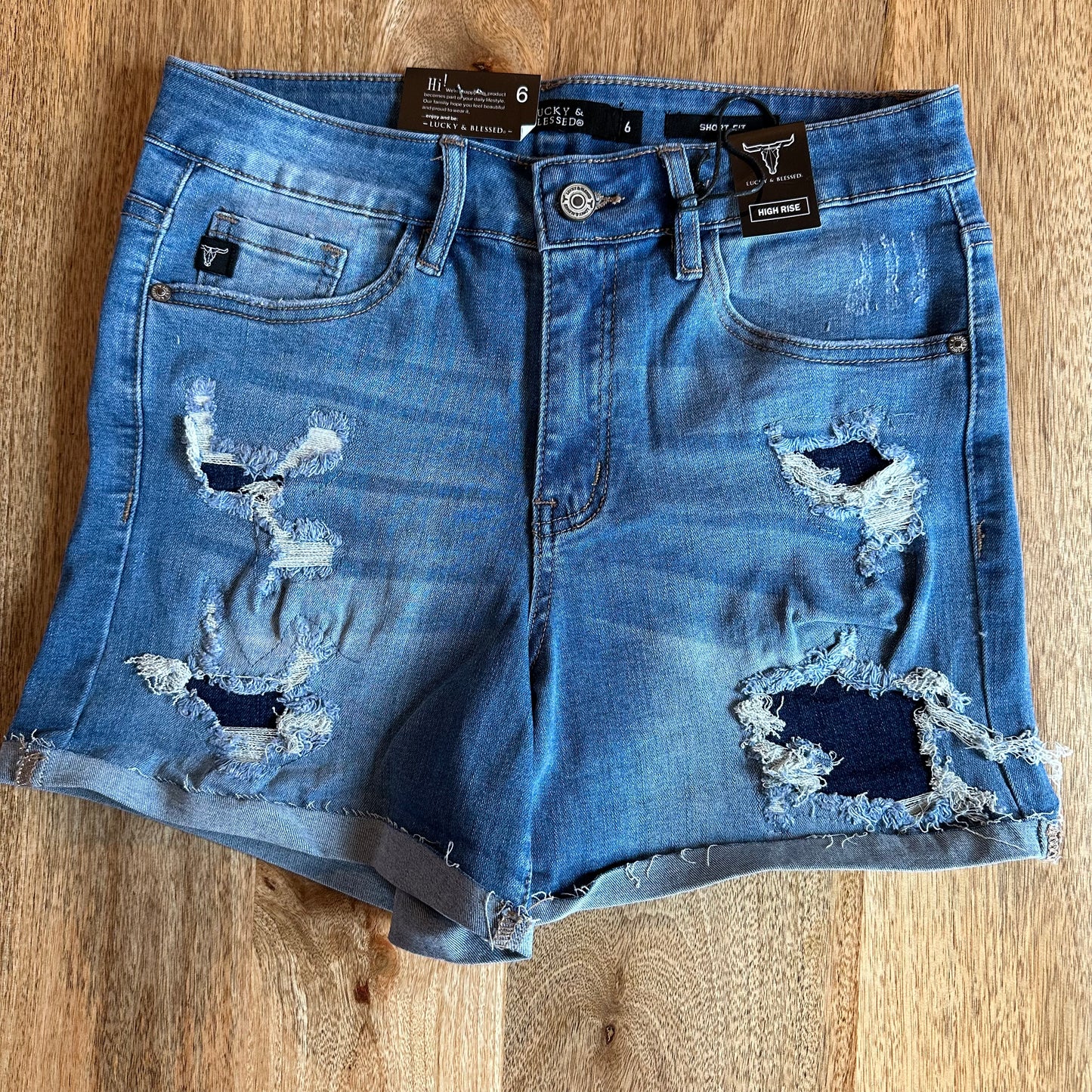 Medium Wash Distressed Patch Shorts